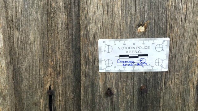 Bullet hole in fence at house in Westmeadows