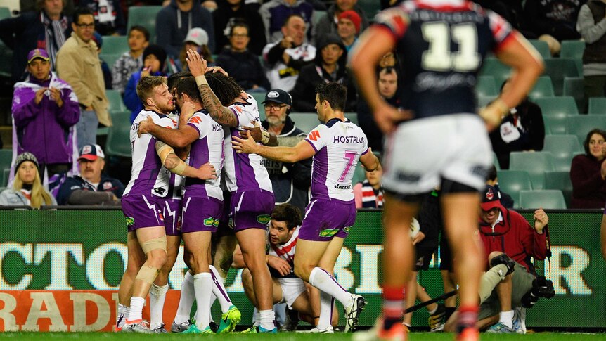 Melbourne Storm celebrate against Sydney Roosters