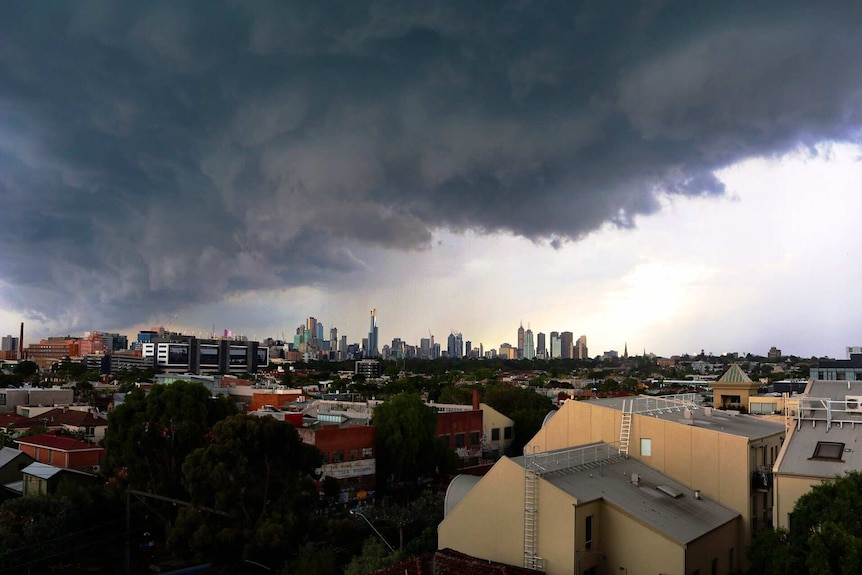 Storm clouds gather over Melbourne before a deluge on December 29, 2016.