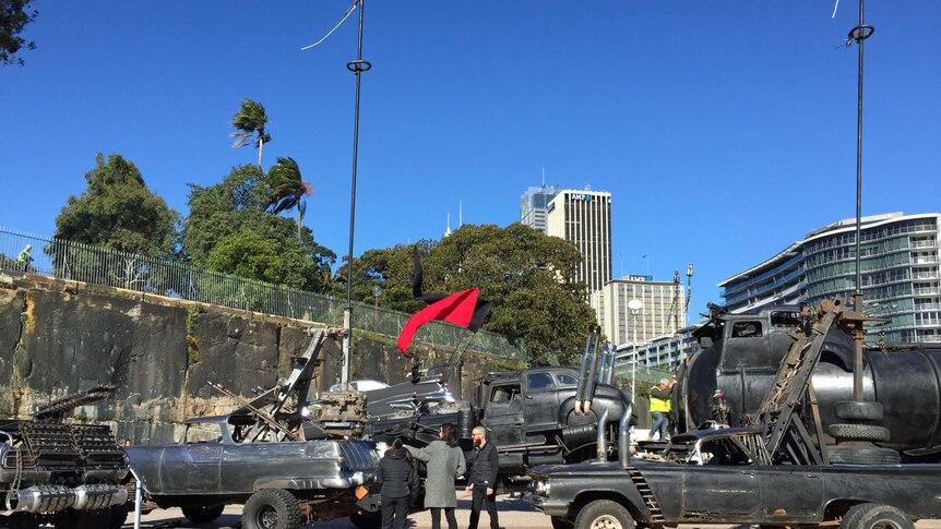 Mad Max Fury Road vehicles, cast and crew at the Sydney Opera House before the film's premiere in Sydney