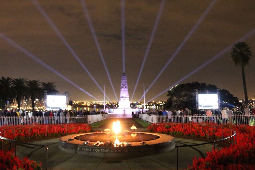 Lasers light up war memorial and eternal flame at Kings Park for Anzac Day 2014