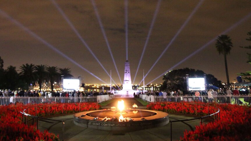 Lasers light up war memorial and eternal flame at Kings Park for Anzac Day 2014