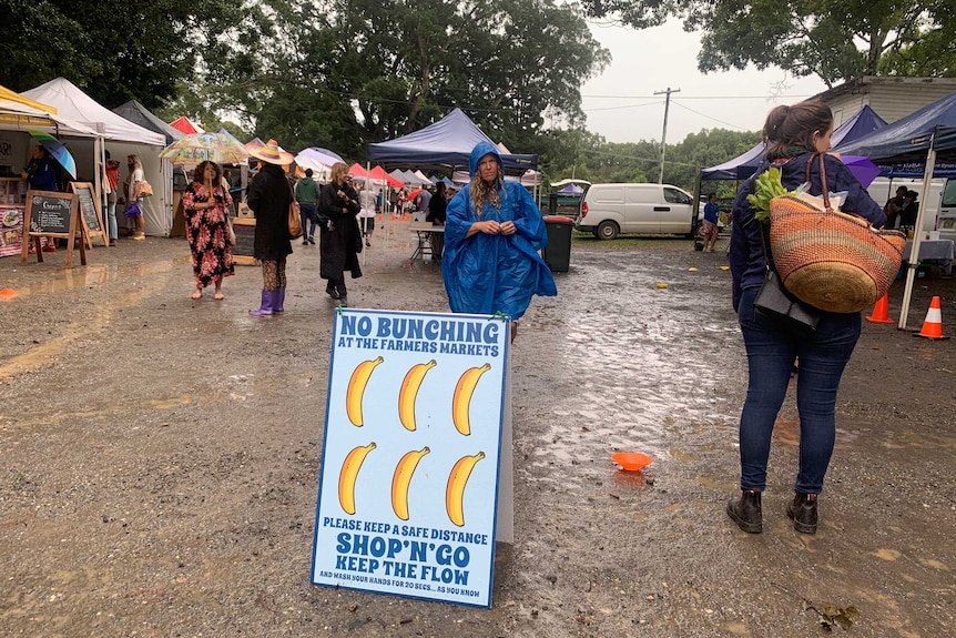 No Bunching at the Farmers Markets sign set up at Mullumbimby Farmers' Market.