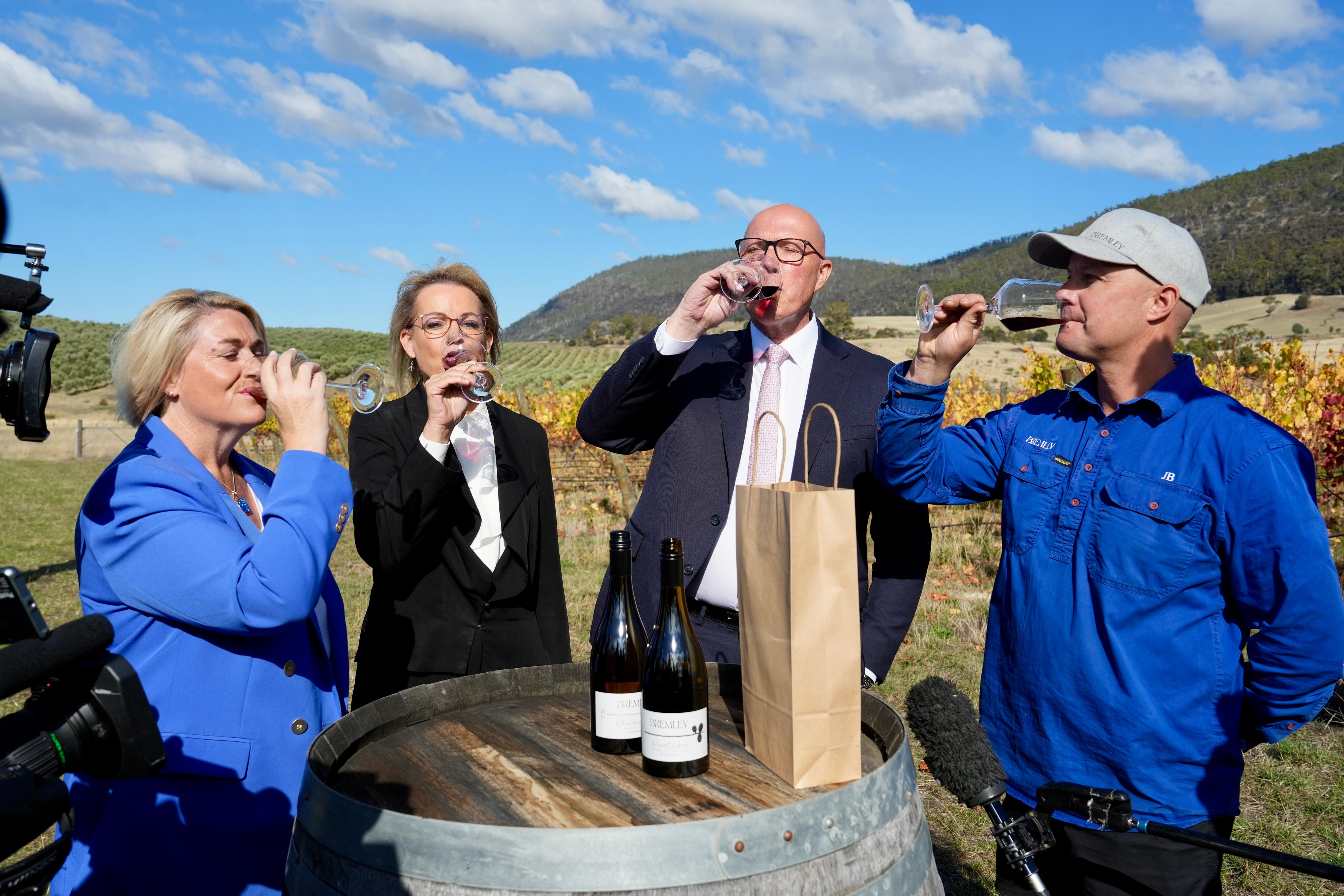 Dutton and other candidates taste red wine