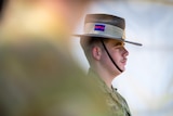 side profile of a soldier looking solemn