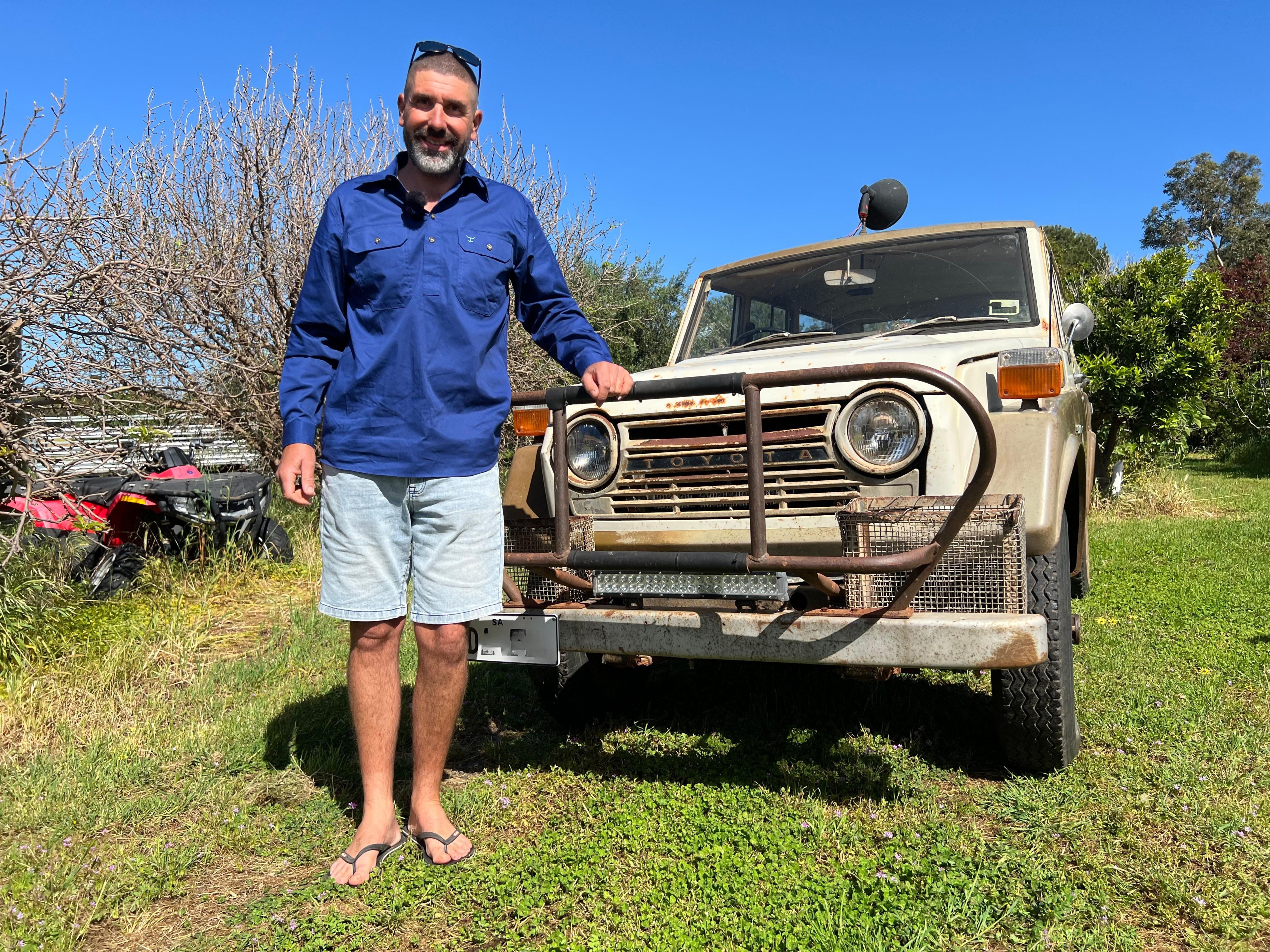 A man with an old 4WD