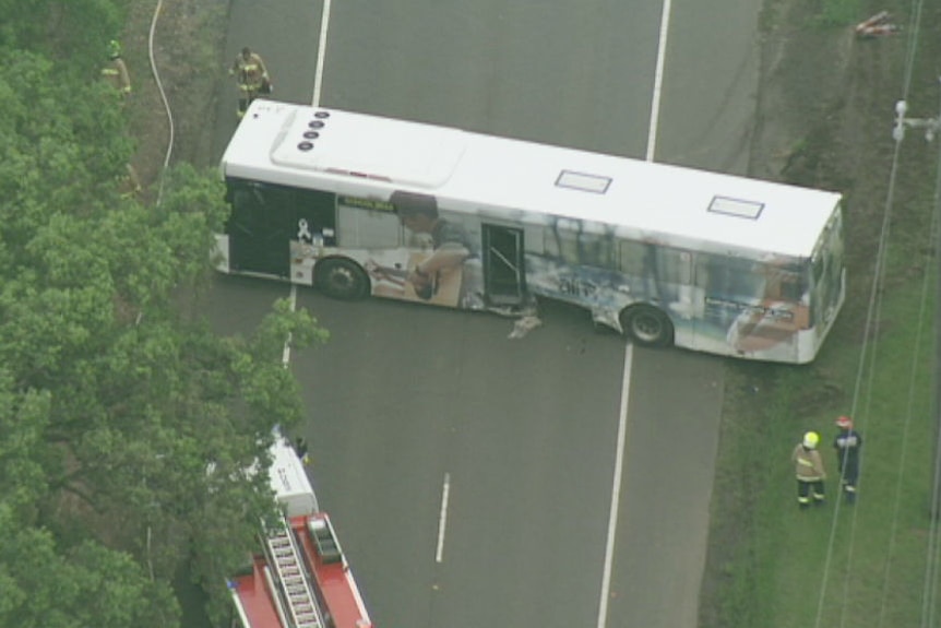 A police critical investigation has begun into a crash between a car and school bus at Londonderry in Sydney's west.