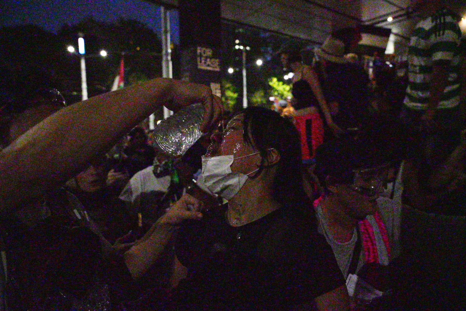 Water poured on woman's eye