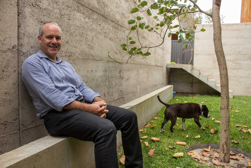 Architect Jonathan Lake in the garden of the family home.