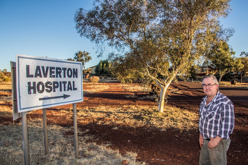 Patrick Hill standing in front of the Laverton Hospital grounds.