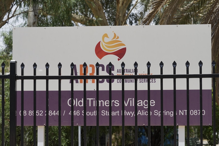 A large sign at the front of the Old Timers Village aged care facility in Alice Springs.