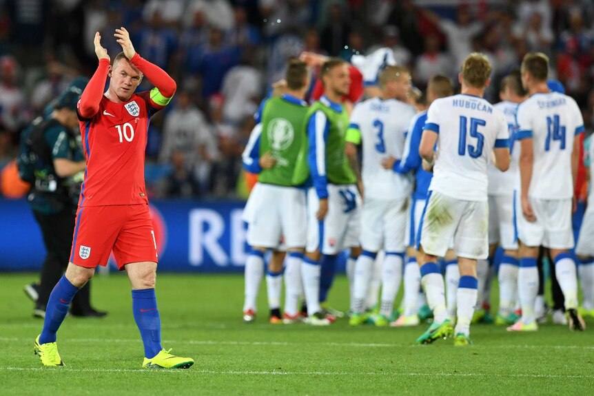 Wayne Rooney acknowledges the fans after England's 0-0 Euro draw with Slovakia