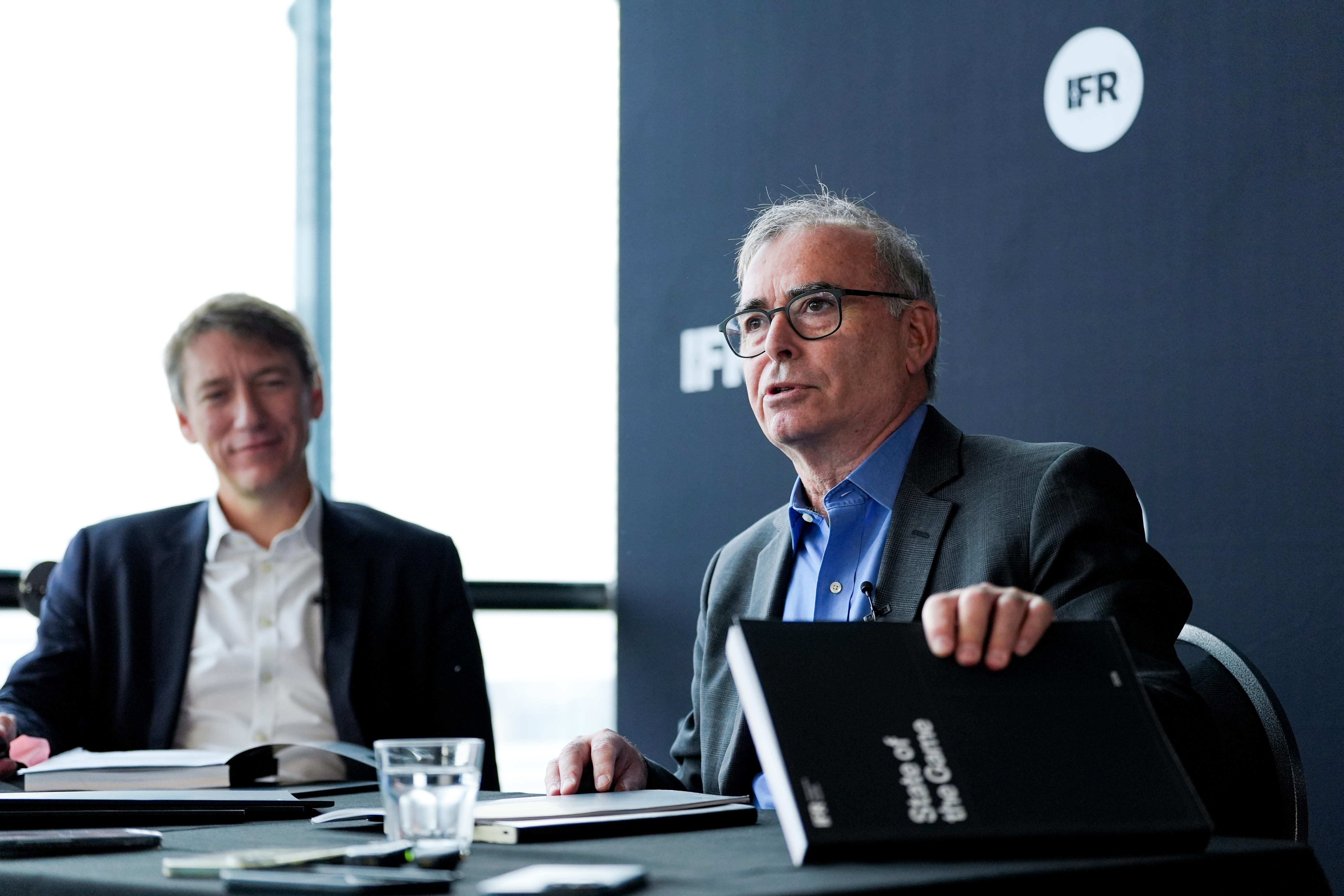 Regulator says he would quit over political influence in Man City scandal