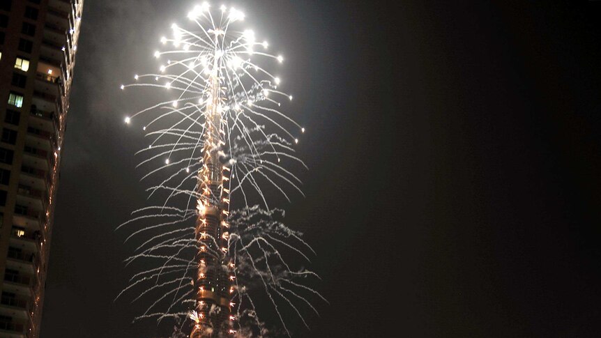 Fireworks explode off Burj Khalifa in Dubai.