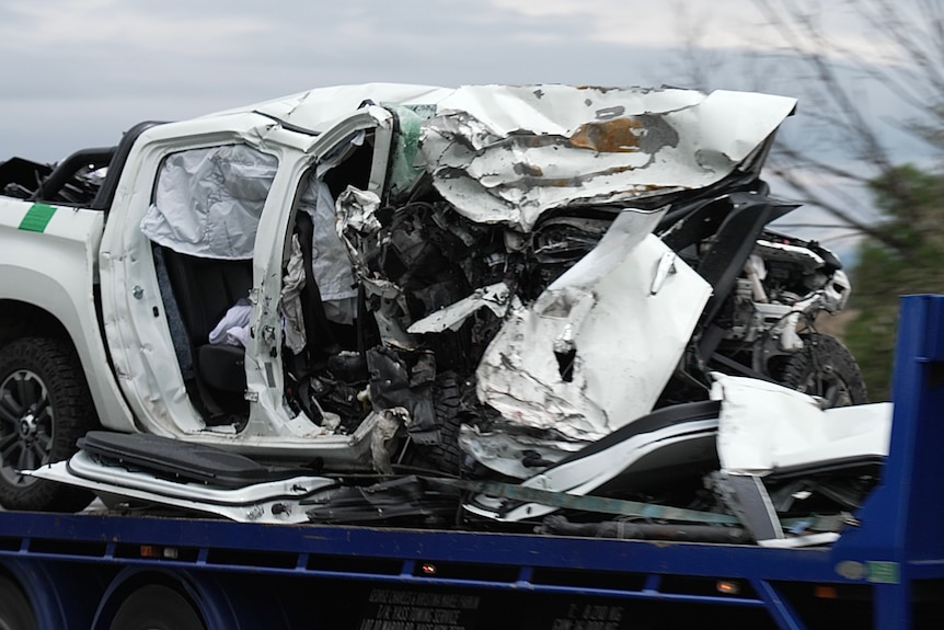 Crushed vehicle on Barton Highway
