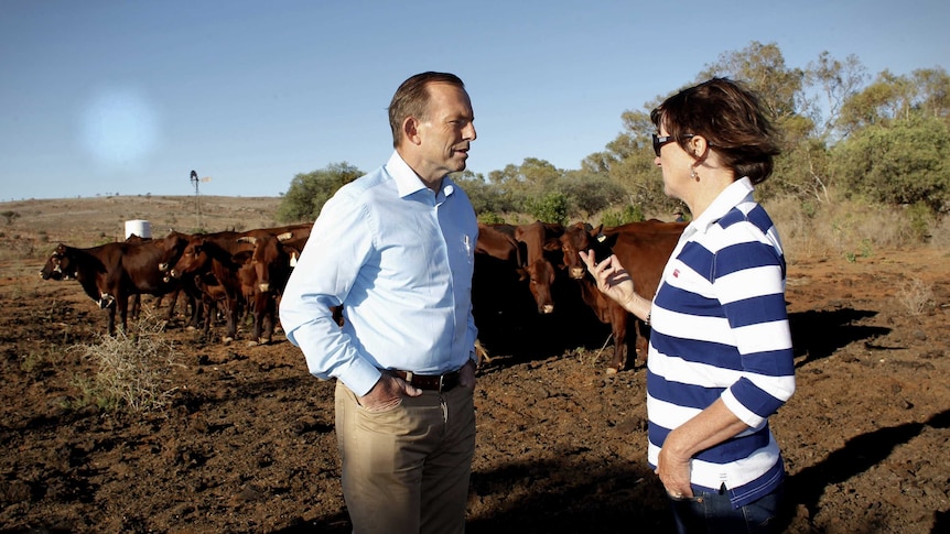 Prime Minister Tony Abbott meets farmers as part of a drought tour this month.