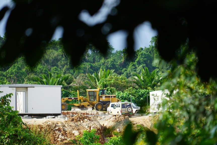 Heavy machinery is scene at the new accommodation site on Manus Island.