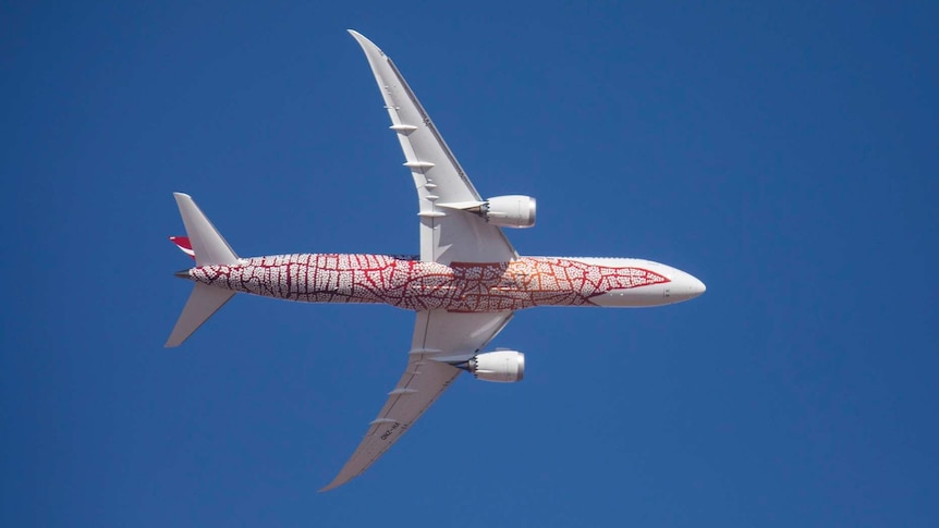 A Qantas Boeing 787 Dreamliner seen from the ground.