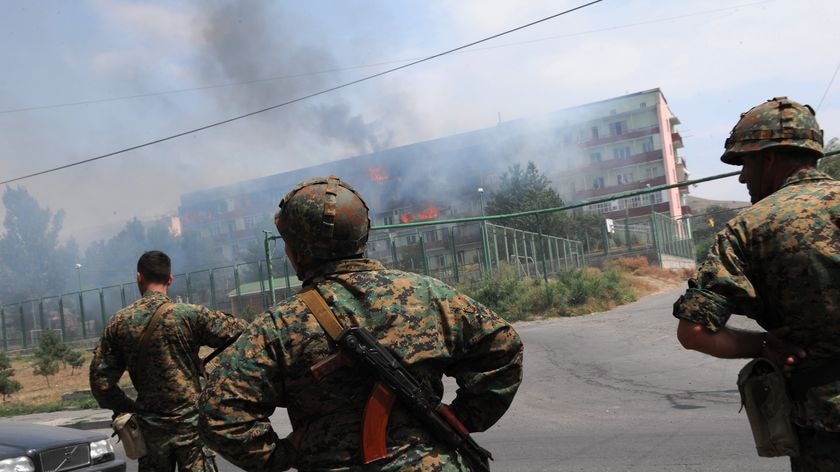 'State of war': Georgian soldiers in Gori after Russian warplanes bombed the city.