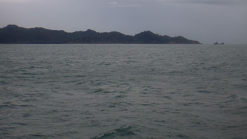 Webcam images from Cleveland Bay, Townsville show the sea before midday on Thursday.