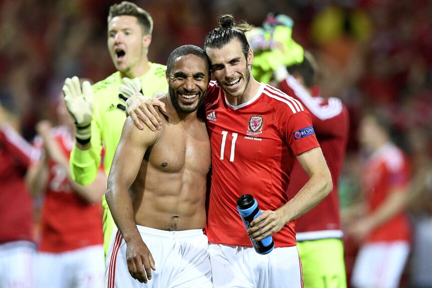 Wales' Gareth Bale and Ashley Williams after beating Russia at Euro 2016
