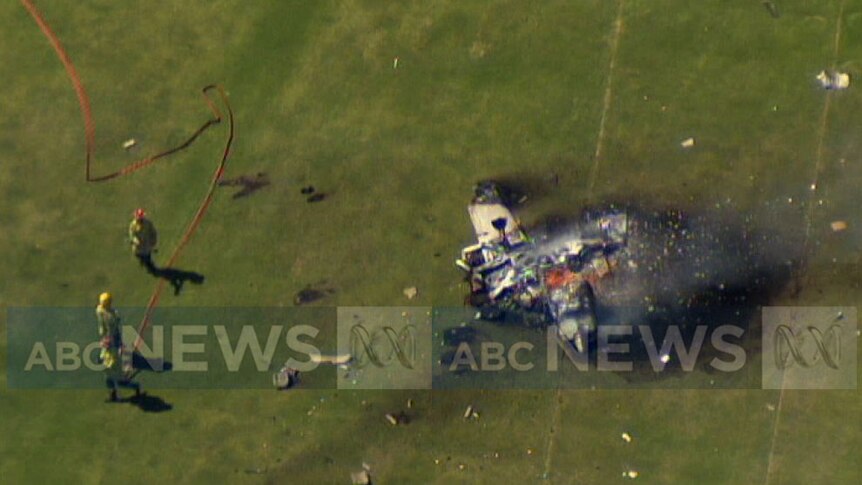 Firefighters near light plane crashed onto an oval in South Lake