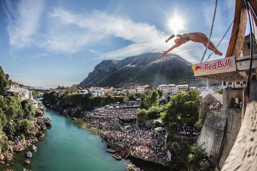 Lysanne Richard of Canada dives from the 21.5 metre platform on Stari Most.
