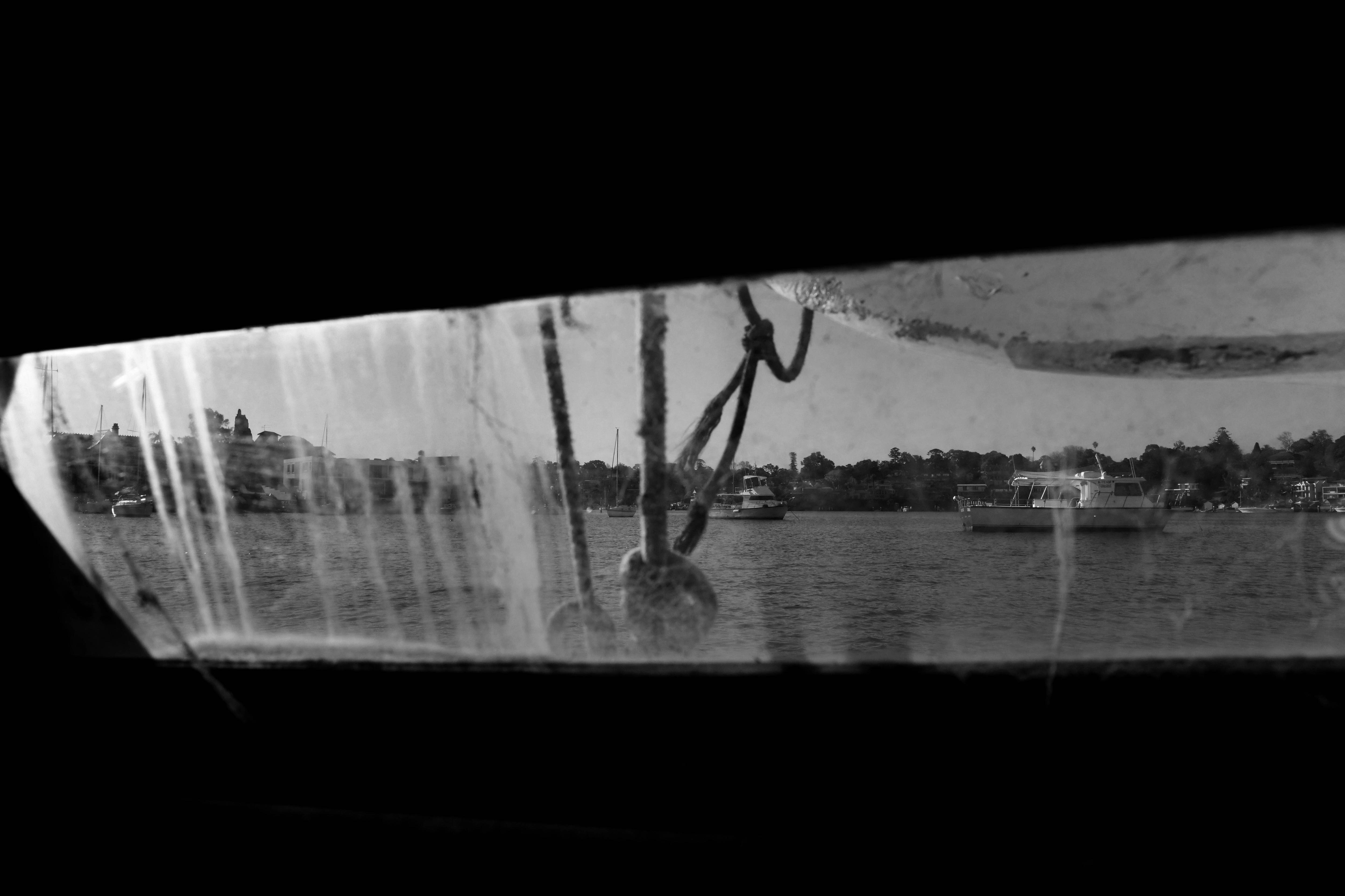 The dirty window looking out onto the river